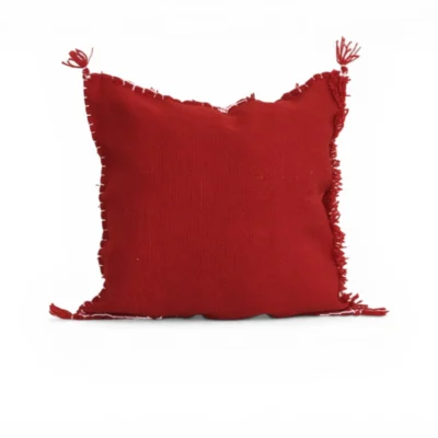 Back view of handmade Moroccan Atlas Mountain wool pillow cover, plain deep red natural wool, hidden zipper closure, Khenifra Morocco