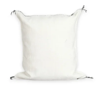 Close-up of black Berber diamond motif on white sabra cactus silk pillow