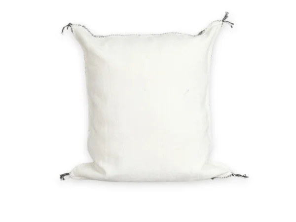 Close-up of black Berber diamond motif on white sabra cactus silk pillow