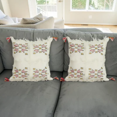Set of Moroccan wool pillows on sofa
