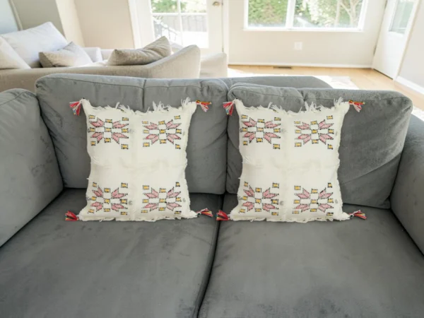 Set of Moroccan wool pillows on sofa