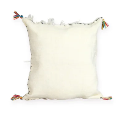 Back side of handmade Moroccan wool pillow in ivory