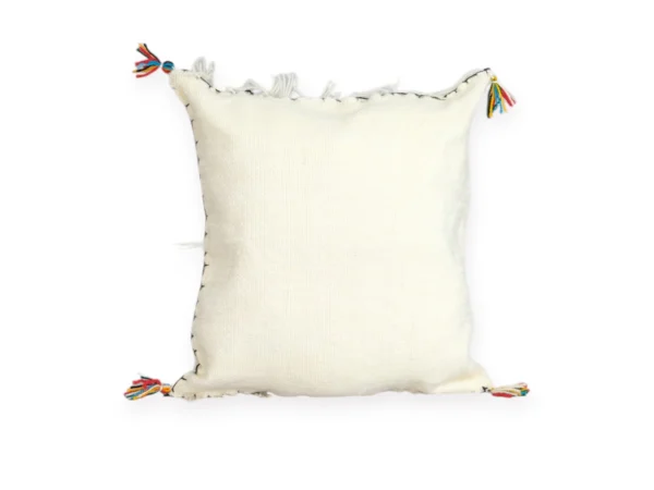 Back side of handmade Moroccan wool pillow in ivory