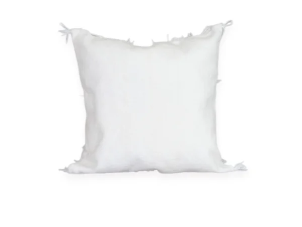 Close-up white wool fringes and silver mdebja sequins Moroccan Berber Handira pillow Khenifra