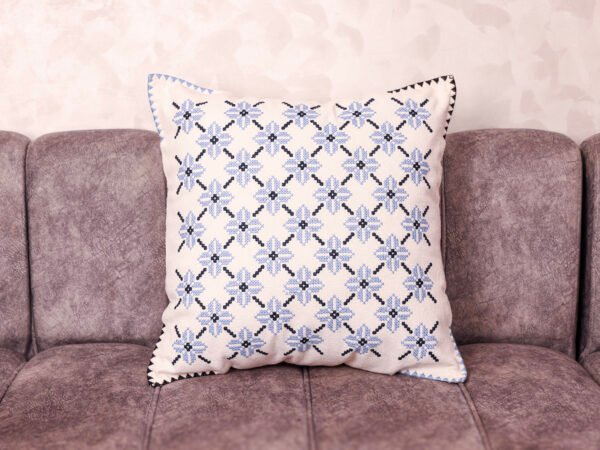 Luxury Fassi embroidered pillow 20×20 in ivory linen with all-over powder-blue star pattern and navy sawtooth border – Tigemi heirloom